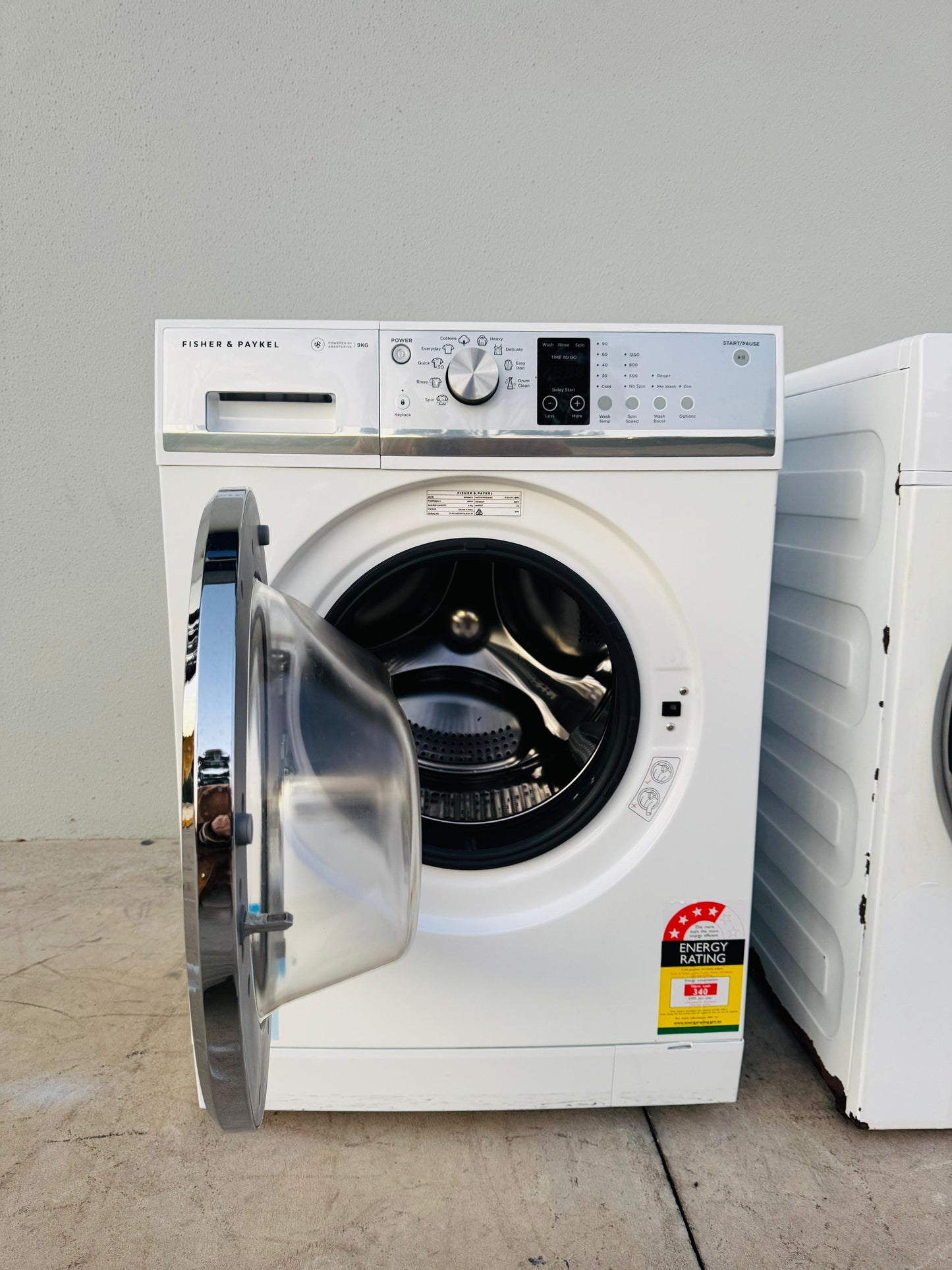 **FISHER & PAYKEL 9KGS FRONT LOADER WASHING MACHINE**
