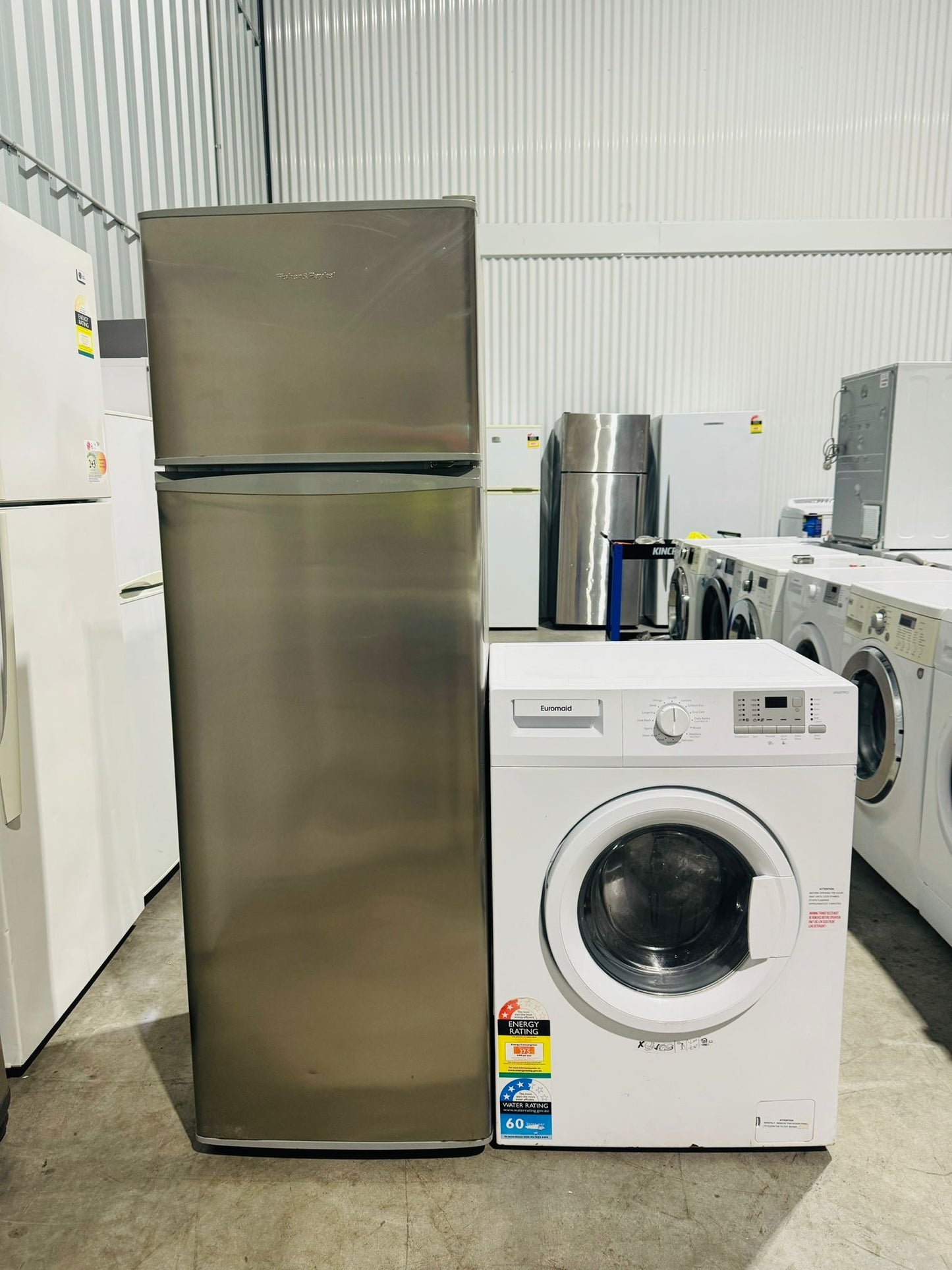 **FISHER & PAYKEL 248 LITRES FRIDGE FREEZER & EUROMAID 5.5 KGS FRONT LOADER WASHING MACHINE COMBO PACKAGE DEAL**