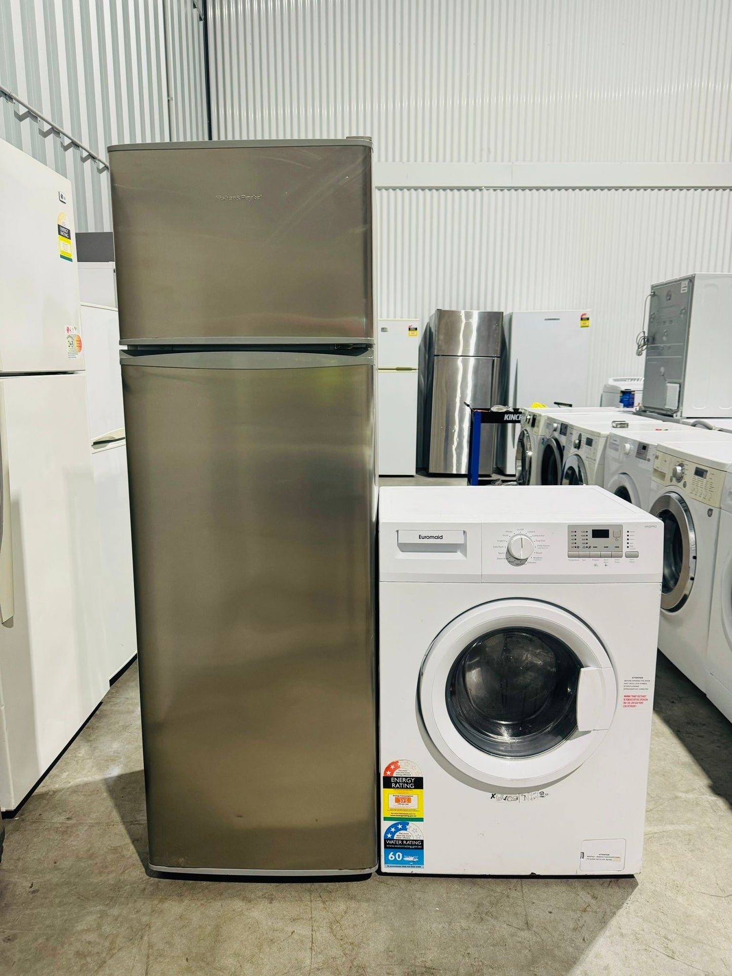 **FISHER & PAYKEL 248 LITRES FRIDGE FREEZER & EUROMAID 5.5 KGS FRONT LOADER WASHING MACHINE COMBO PACKAGE DEAL**