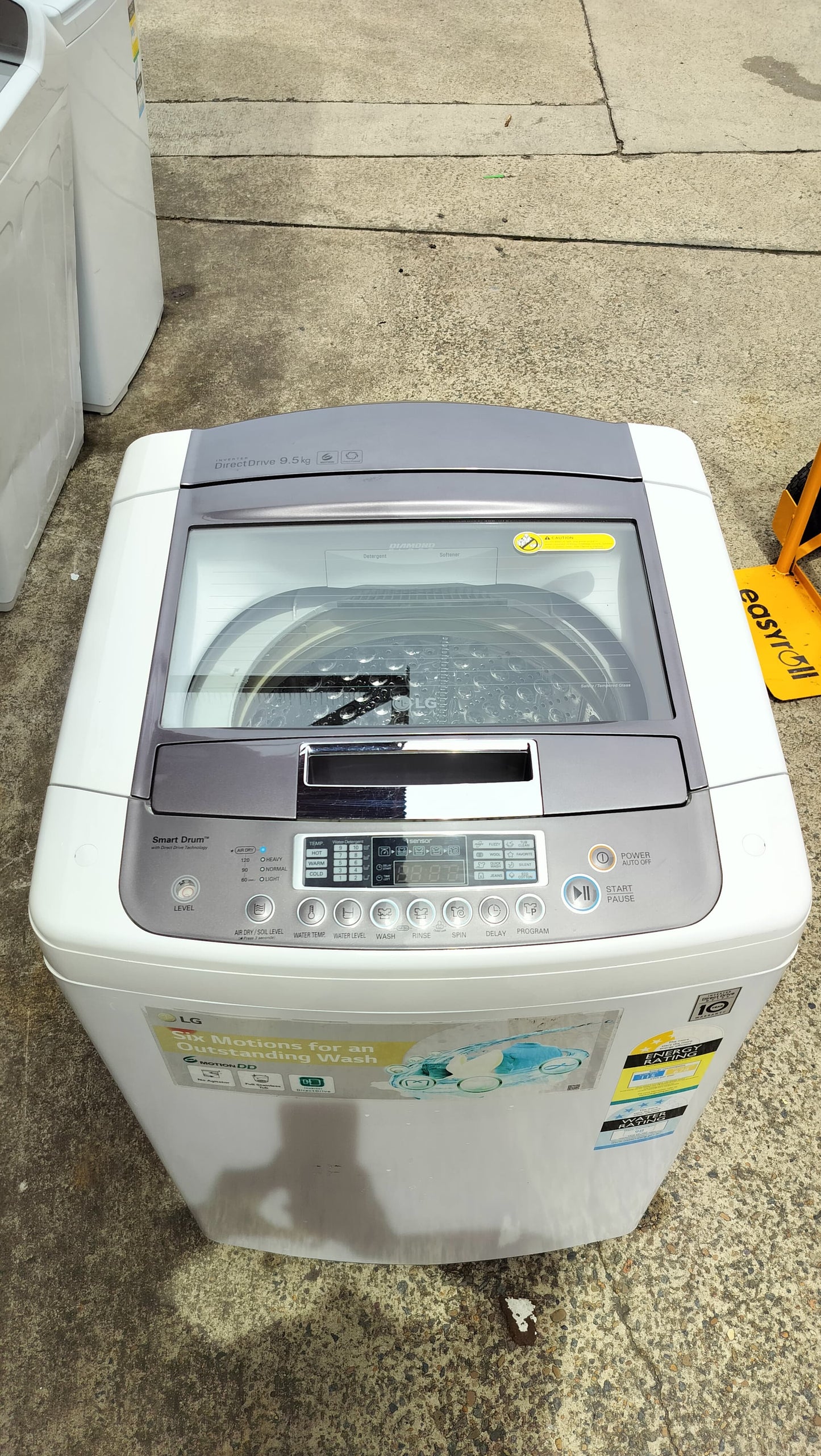 **LG 9.5 KGS TOP LOADER WASHING MACHINE SMART DRUM**