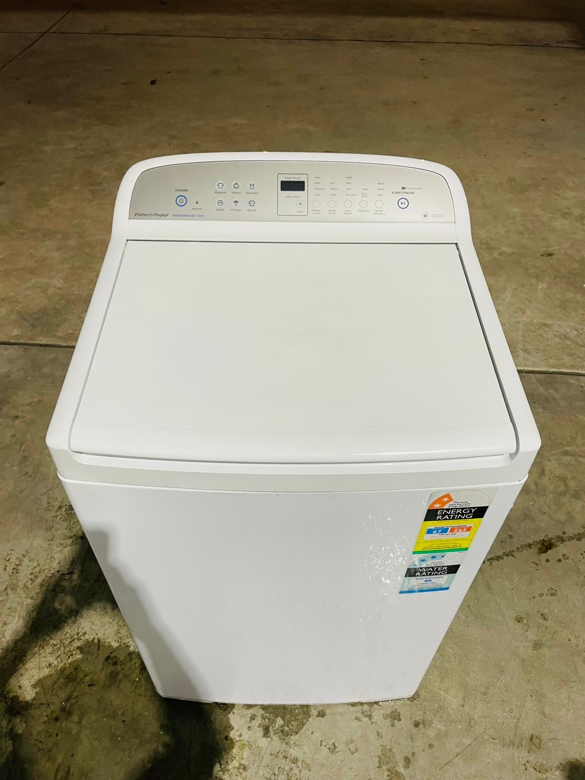 **FISHER & PAYKEL 7 KGS TOP LOADER WASHING MACHINE**