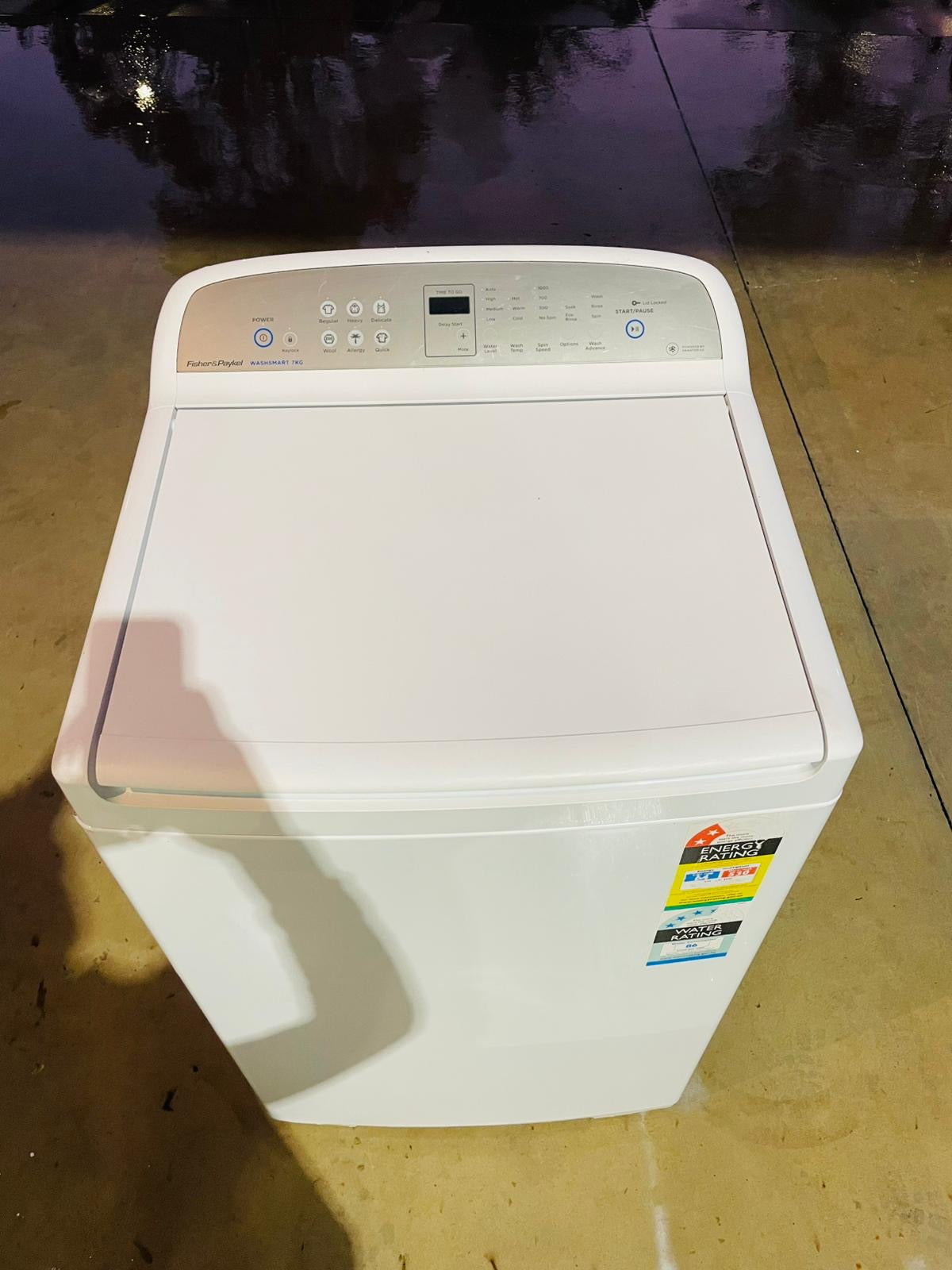 **FISHER & PAYKEL 7 KGS TOP LOADER WASHING MACHINE**