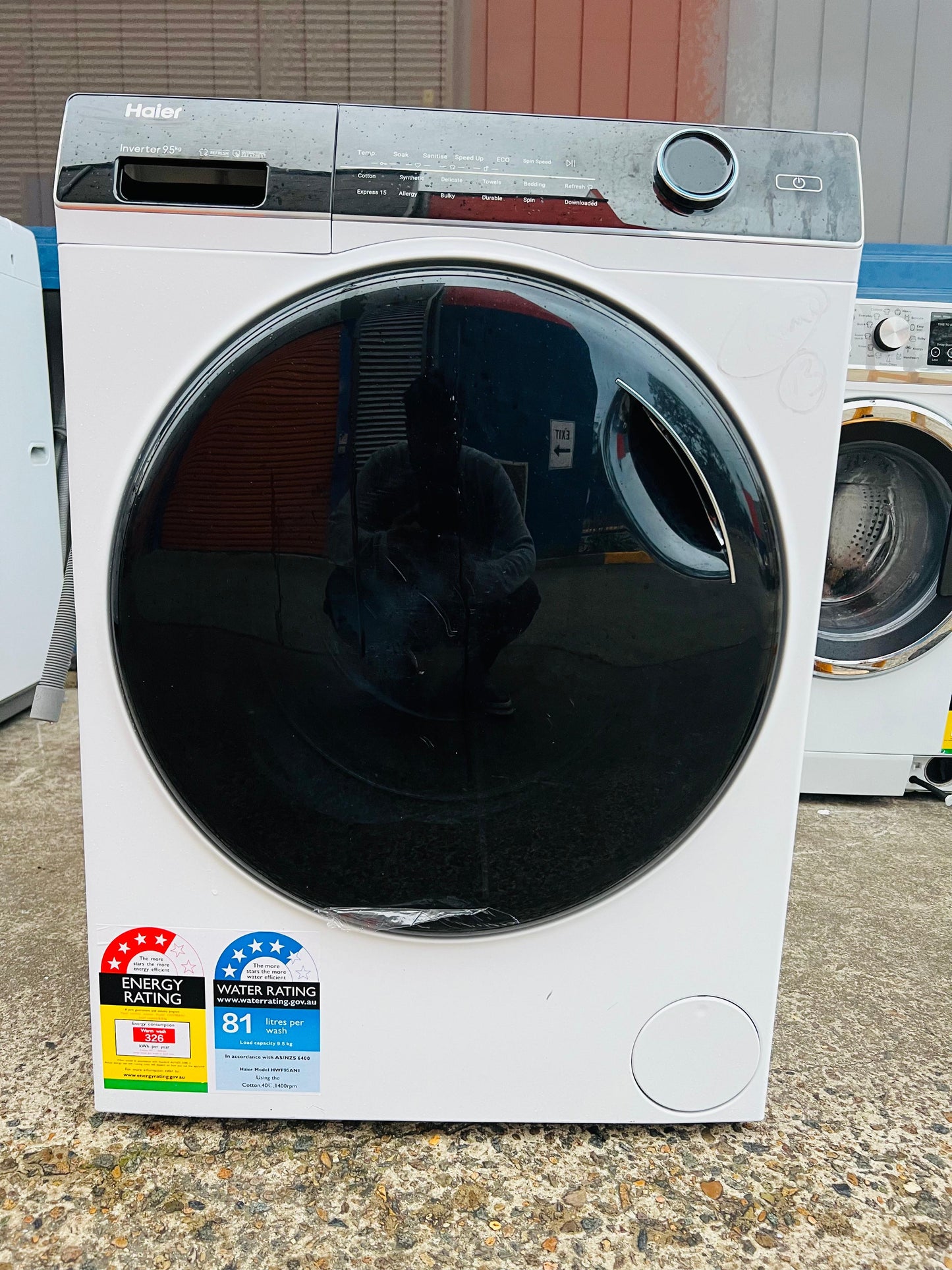 **HAIER 9.5 KGS FRONT LOADER WASHING MACHINE**