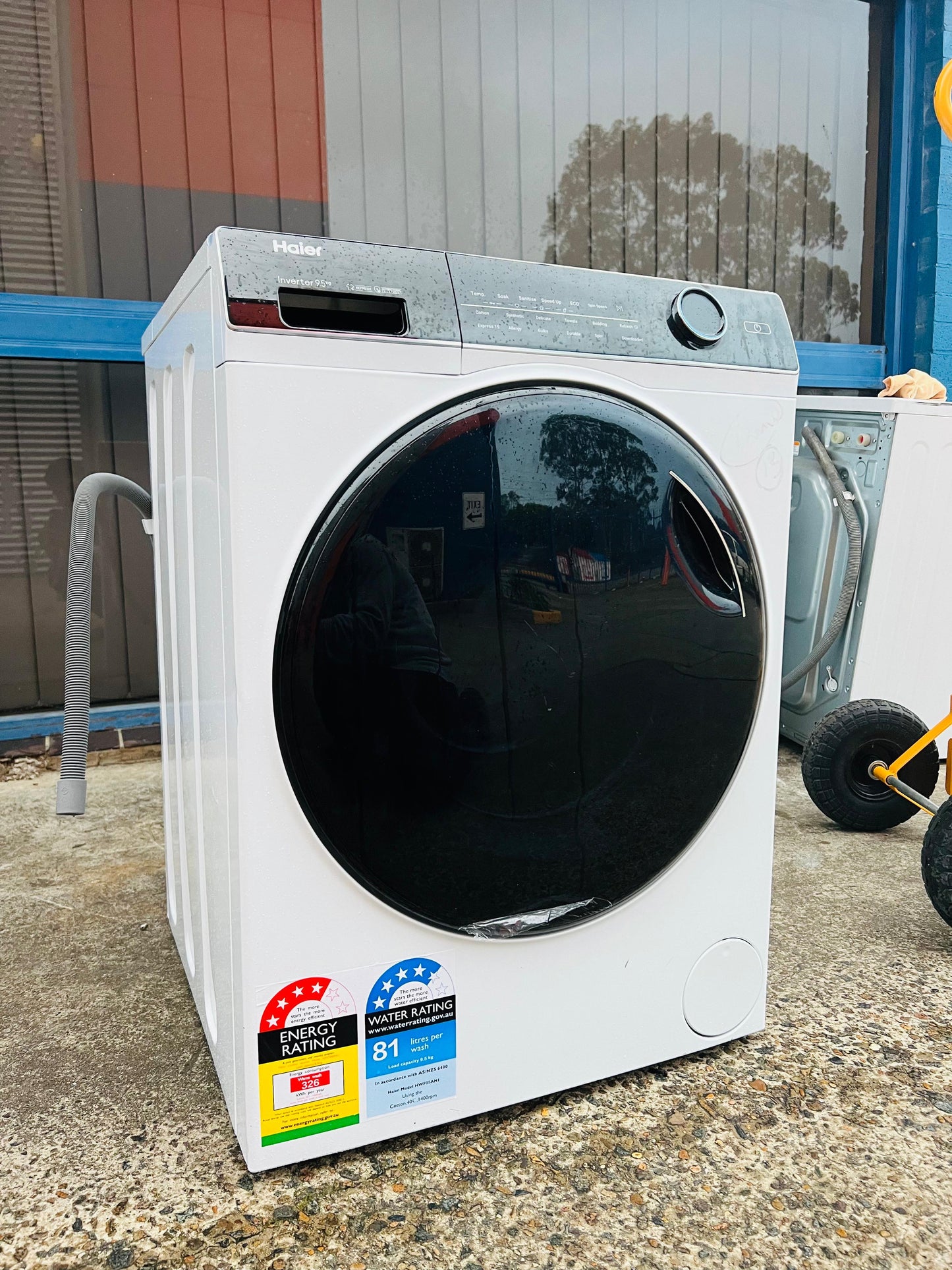 **HAIER 9.5 KGS FRONT LOADER WASHING MACHINE**