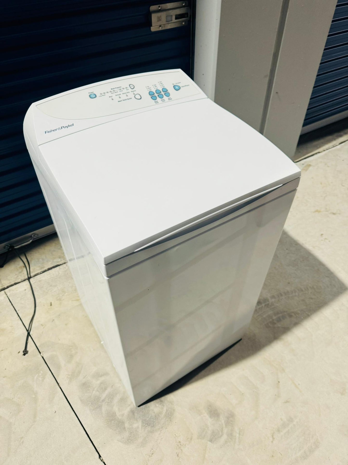 **FISHER & PAYKEL 5.5 KGS TOP LOADER WASHING MACHINE**