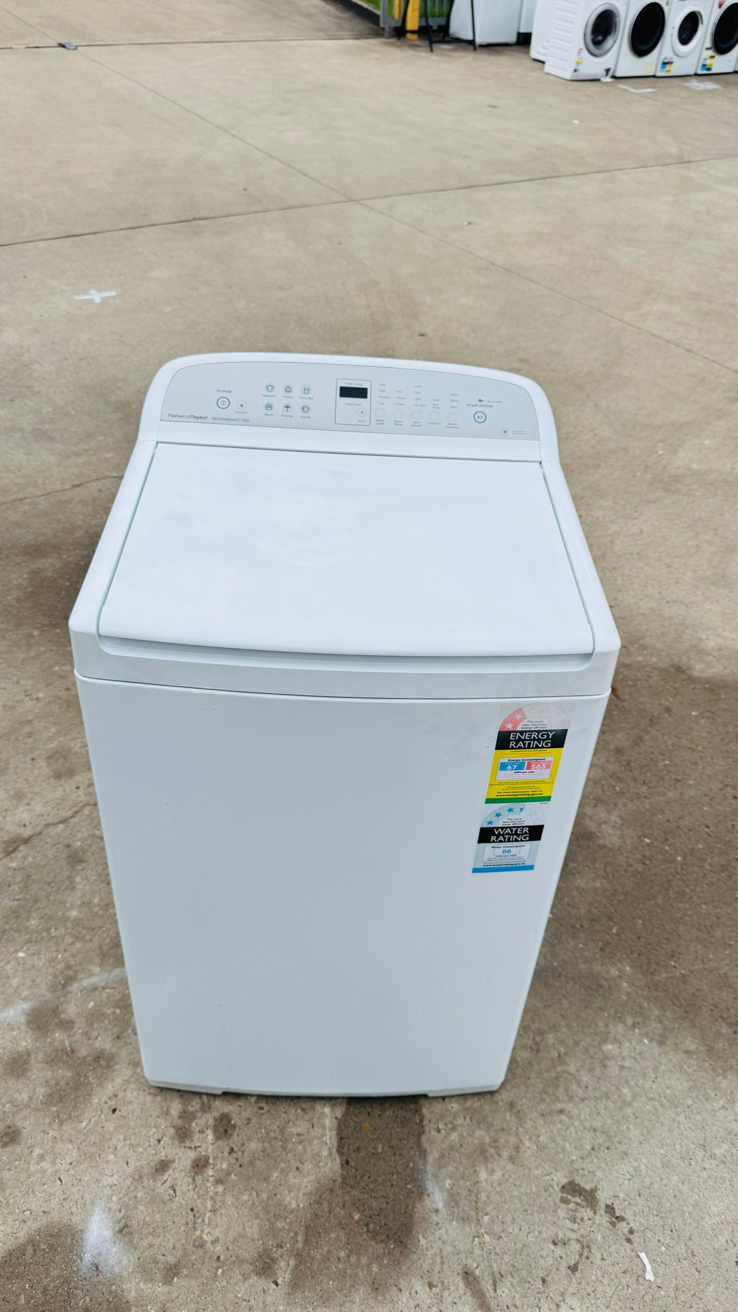 FISHER AND PAYKEL 7KGS TOP LOADER WASHING MACHINE