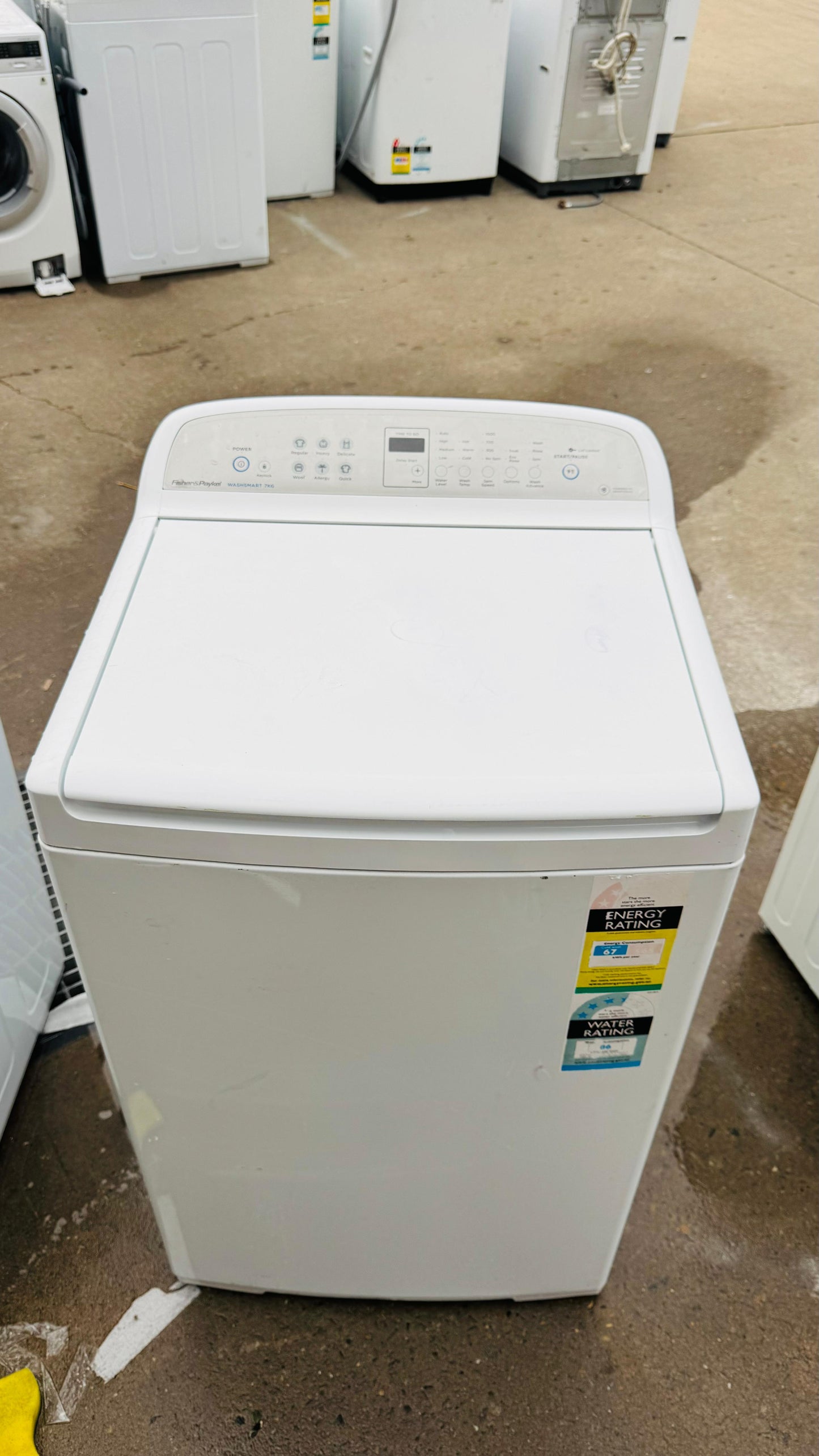 FISHER AND PAYKEL 7KGS TOP LOADER WASHING MACHINE