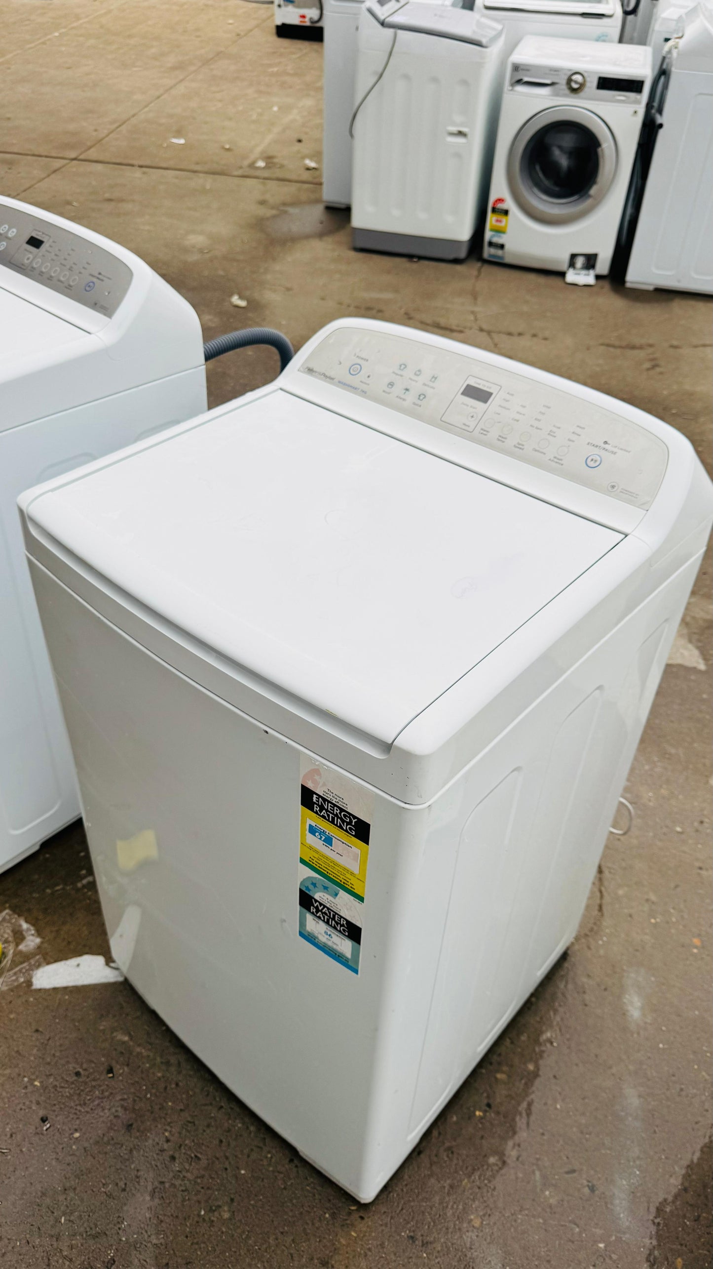 FISHER AND PAYKEL 7KGS TOP LOADER WASHING MACHINE
