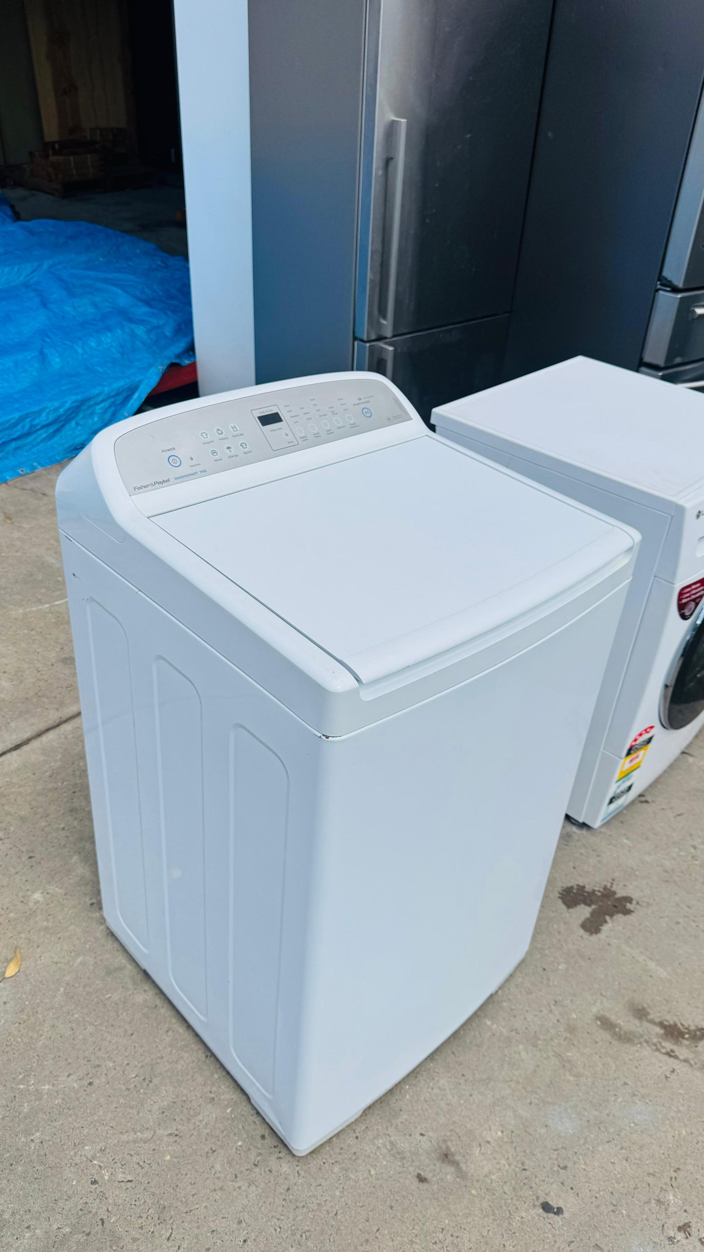FISHER AND PAYKEL 7KGS TOP LOADER WASHING MACHINE