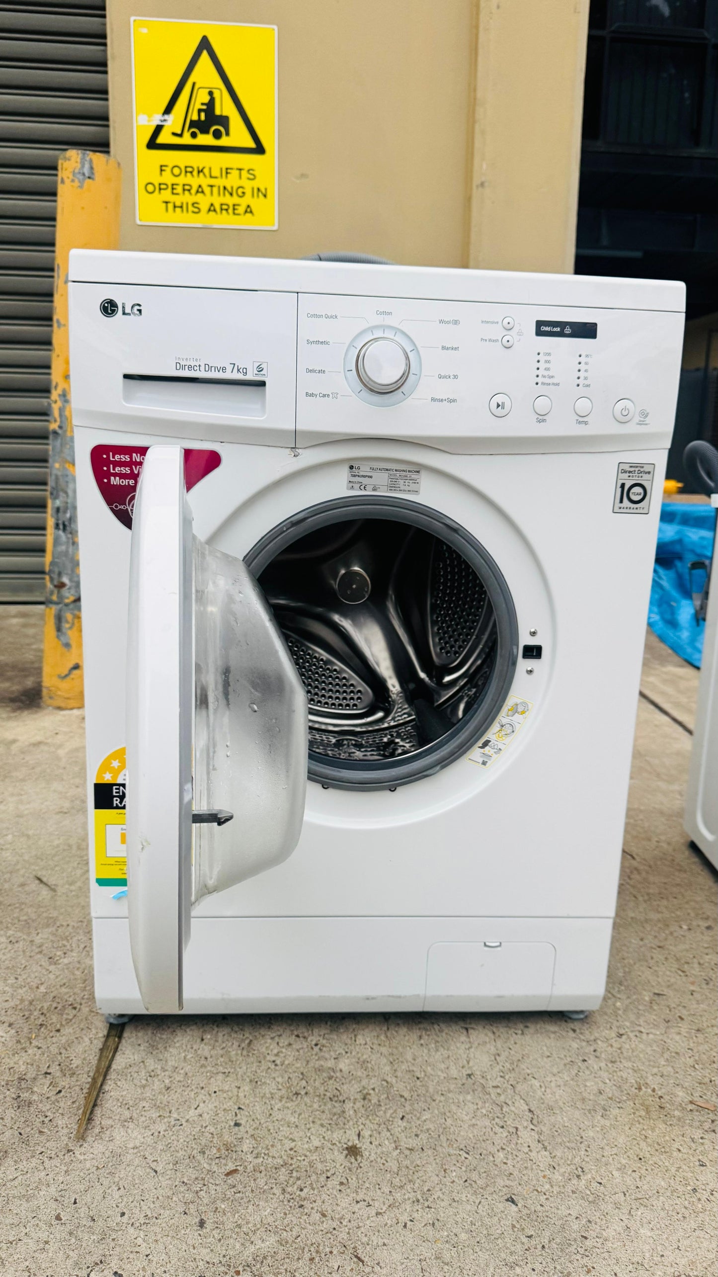 LG 7KGS FRONT LOADER WASHING MACHINE