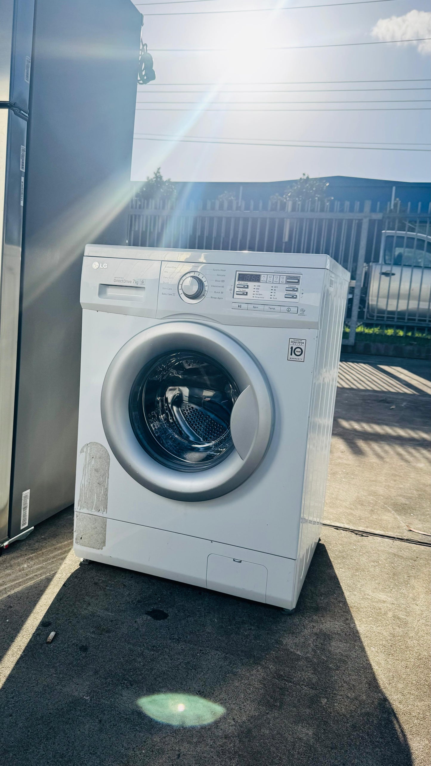 LG 7KGS FRONT LOADER WASHING MACHINE
