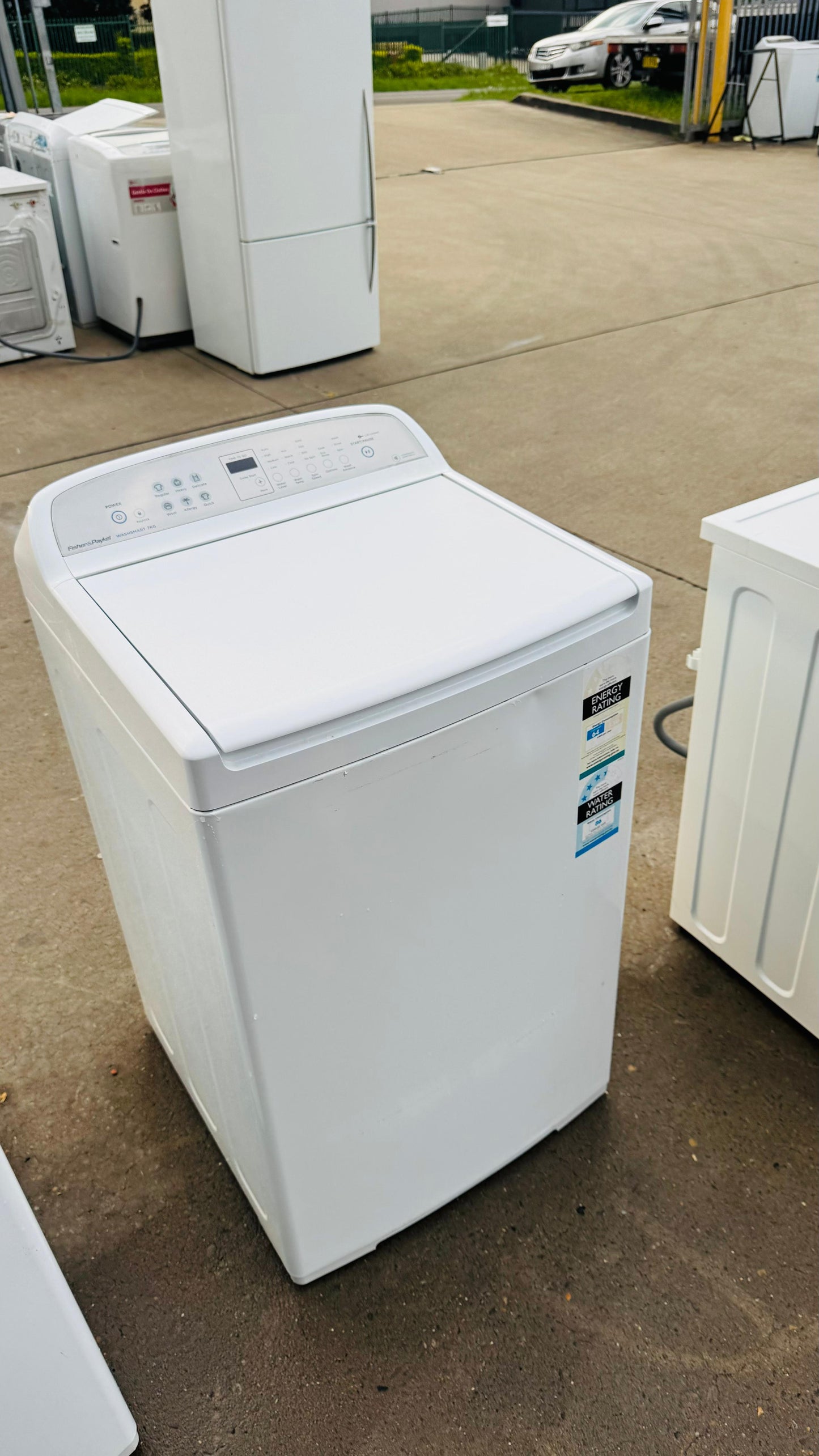 FISHER AND PAYKEL 7KGS TOP LOADER WASHING MACHINE