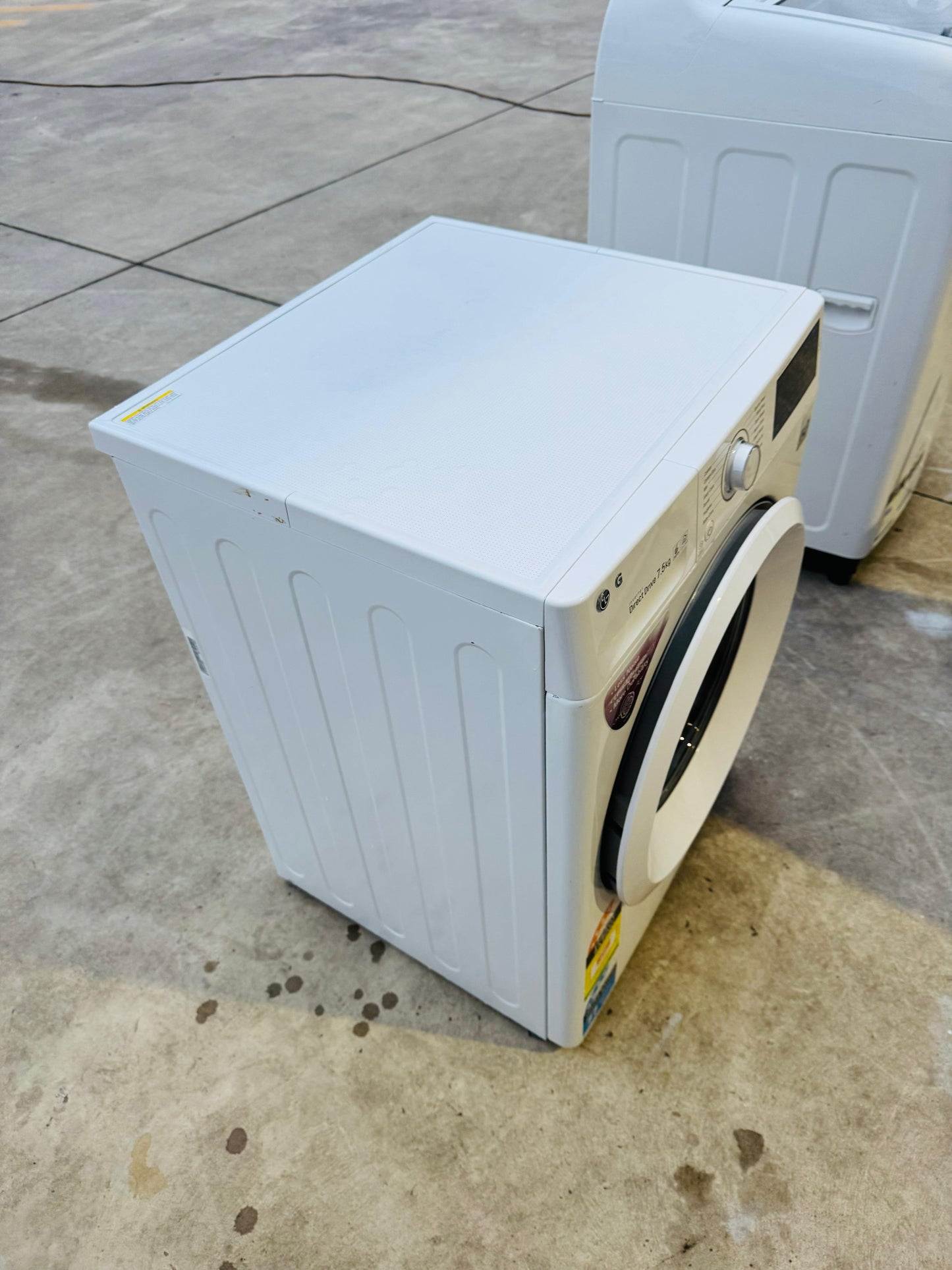 LG 7.5KGS FRONT LOADER WASHING MACHINE.