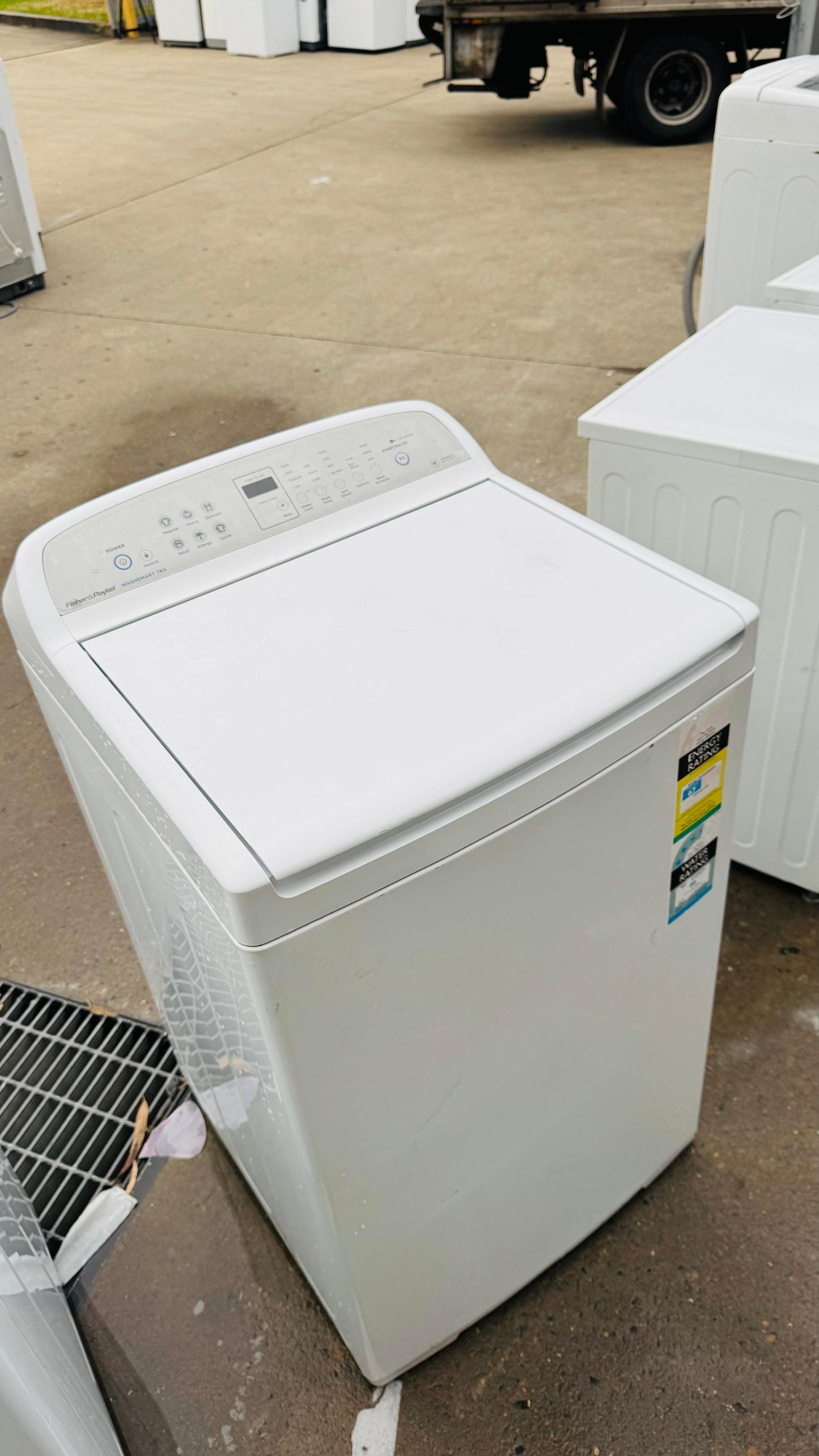 FISHER AND PAYKEL 7KGS TOP LOADER WASHING MACHINE